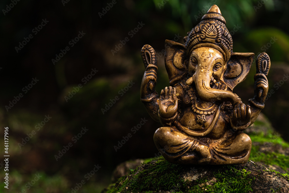 Ganesh Statue in Garden Background with Copy Space