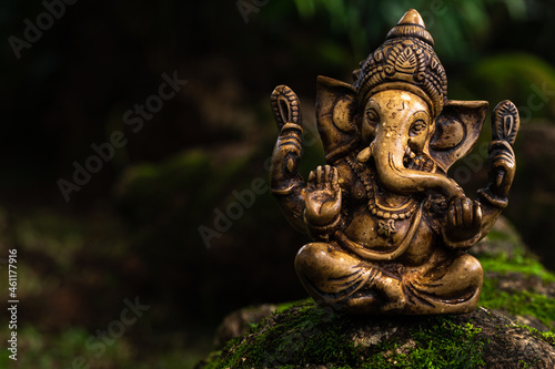 Ganesh Statue in Garden Background with Copy Space