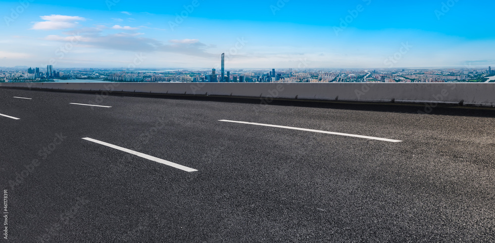 Fototapeta premium Empty asphalt road and city skyline and building landscape, China.