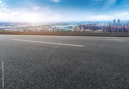 Empty asphalt road and city skyline and building landscape, China.