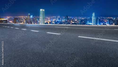 Empty asphalt road and city skyline and building landscape, China.