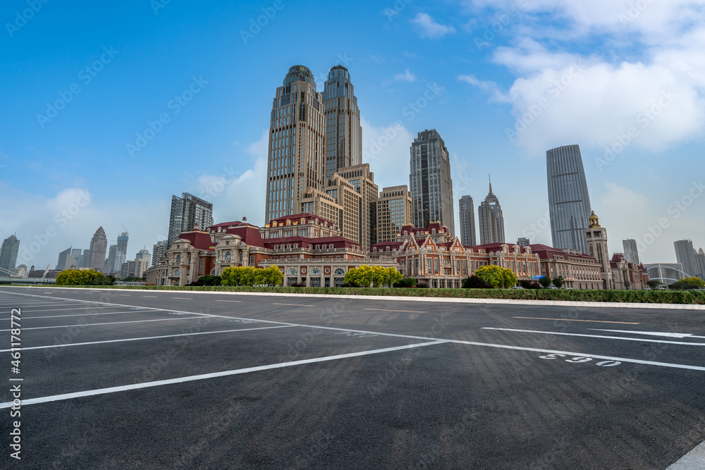 Empty asphalt road and city skyline and building landscape, China. Empty asphalt road and city skyline and building landscape, China.