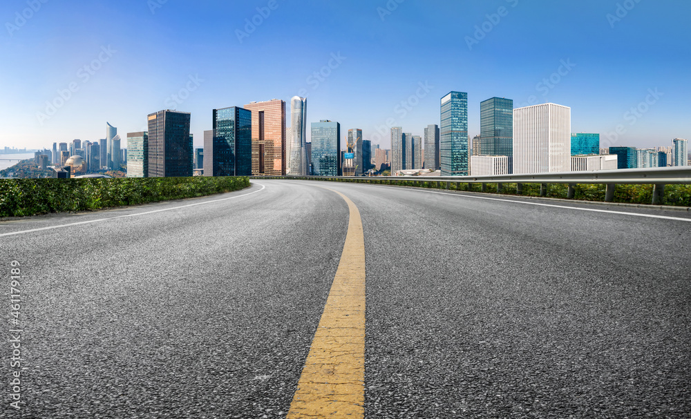 Empty asphalt road and city skyline and building landscape, China. Empty asphalt road and city skyline and building landscape, China.