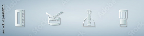 Set Harmonica, Drum with drum sticks, Balalaika and African djembe. Paper art style. Vector