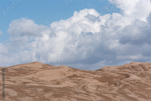 view from Nature and landscapes of dasht e lut or sahara desert after the rain with wet sand dunes and cloudy sky. Middle East desert