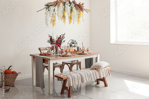 Beautiful table setting for Thanksgiving Day dinner at home photo