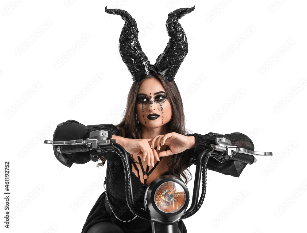 Woman dressed for Halloween with motorcycle on white background Woman dressed for Halloween with motorcycle on white background