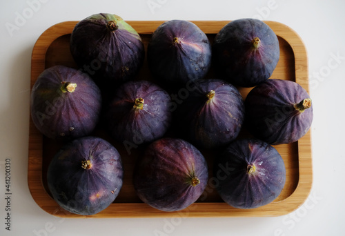 Figs on a bamboo plate top view