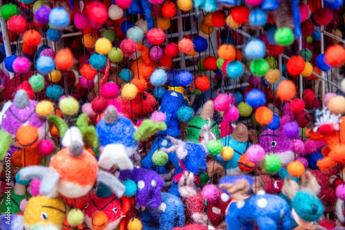 Colorful peluches and toys in a shop  background abstract.