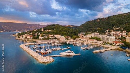 Aerial panoramic view of yacht marina at sunset in Montenegro photo