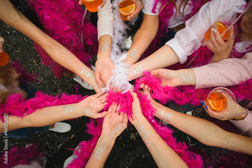 group of people holding hands