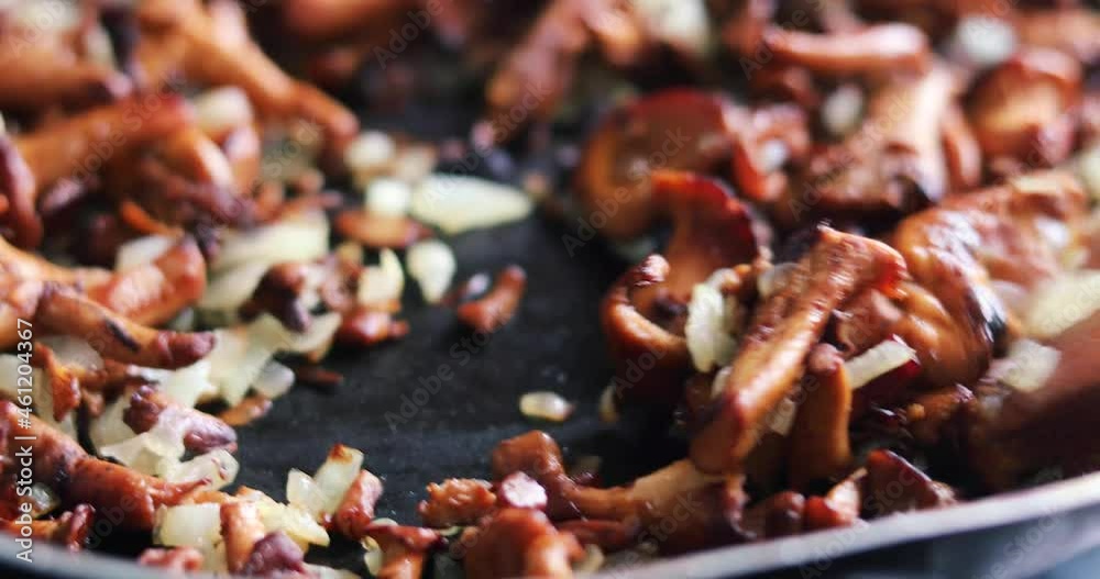 finish stirring cooked fried fresh chanterelle mushrooms with onions, Flat Lay, horizontal finish stirring cooked fried fresh chanterelle mushrooms with onions, Flat Lay, horizontal