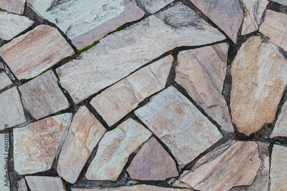 Obraz premium Background of colored granite tiles.The pattern of the texture of colored stone is a patchwork tile.