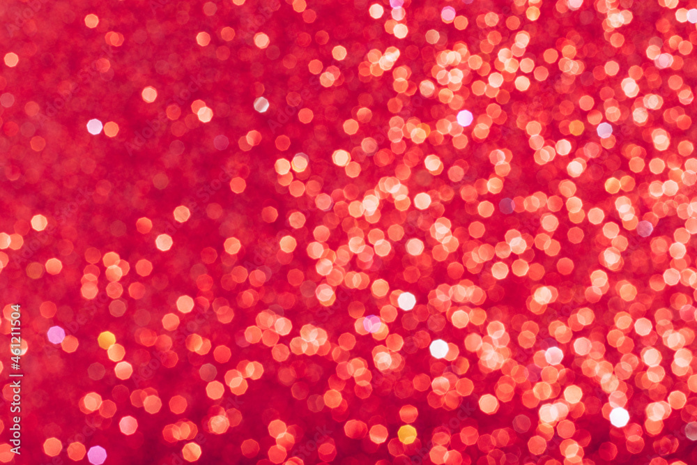 Red glowing sequins blurred background Red glowing sequins blurred background