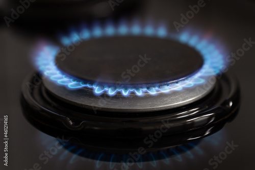 A gas stove in a kitchen. High gas prices and energy crisis concept.