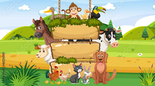 Empty wooden hanging board with various wild animals in the forest