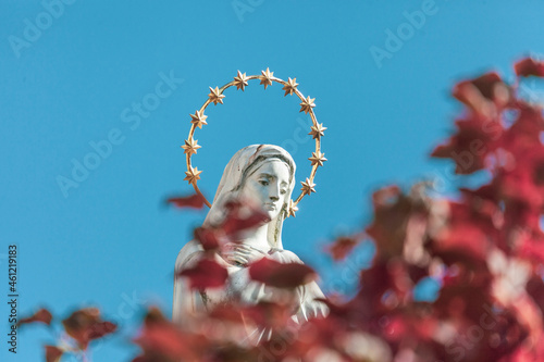 Sculpture of the Mother of God with a golden halo and stars on her head