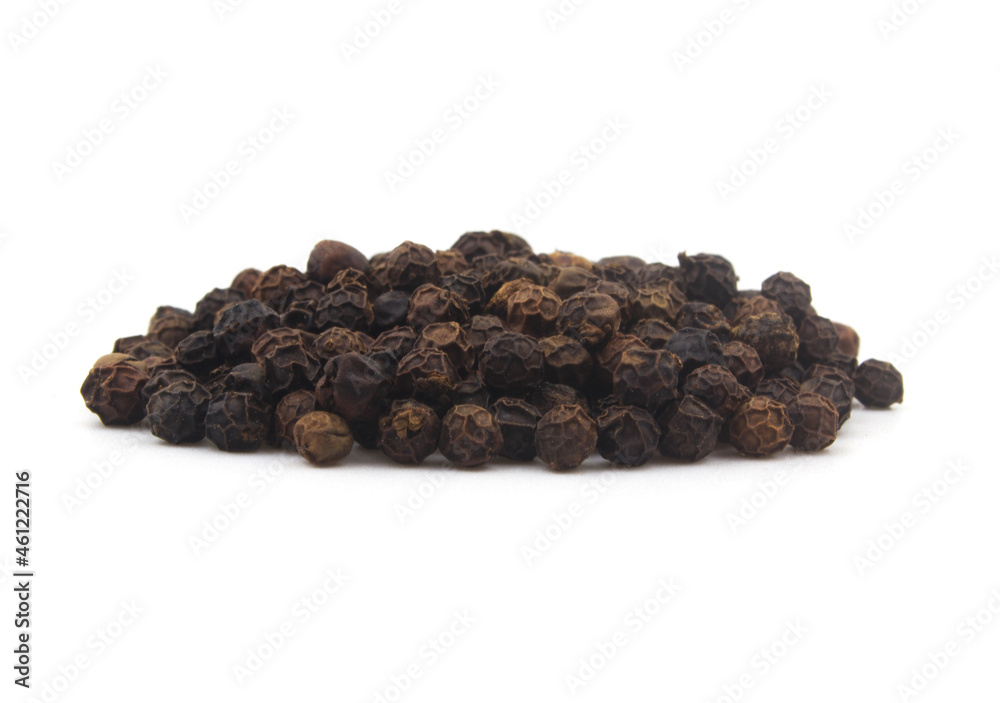 Heap of black peppercorns, black pepper seeds isolated on white Heap of black peppercorns, black pepper seeds isolated on white