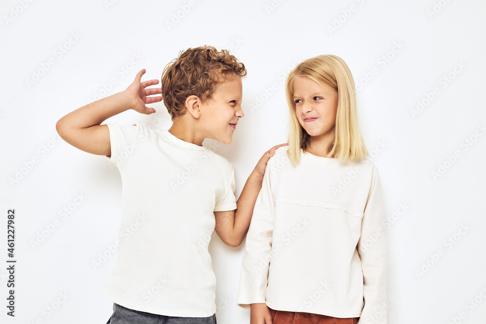 Fototapeta premium Image of boy and girl fight naughty isolated background