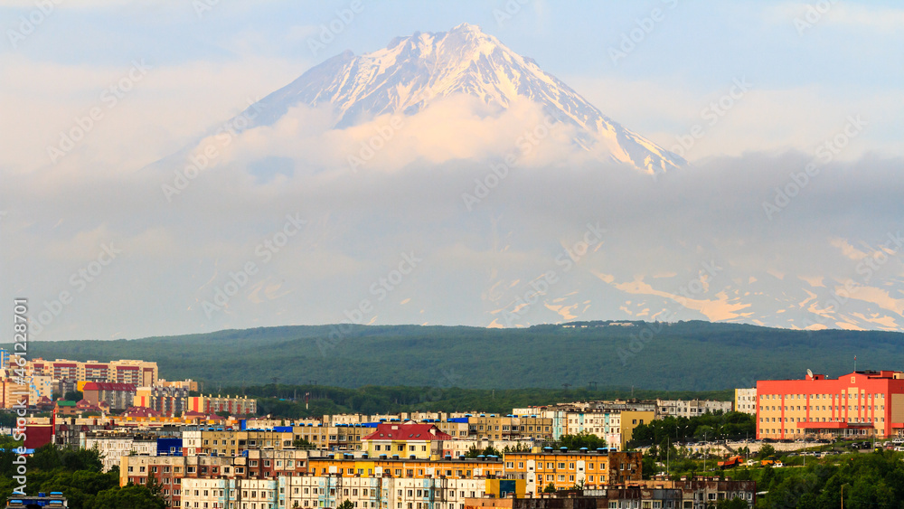 View of the city Petropavlovsk-Kamchatsky on background of Koryaksky Volcano. Russian Far East, Kamchatka Peninsula, Russia