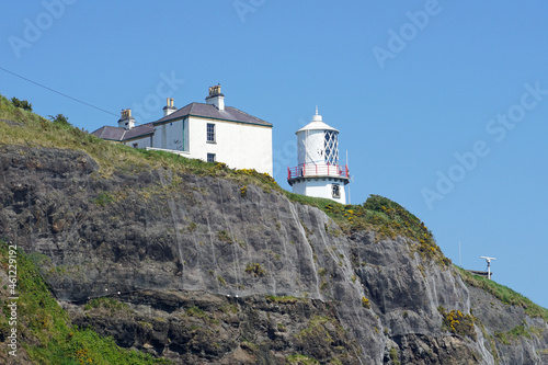 Blackhead Lighthouse located at clifftop near Whitehead, County Antrim, Northern Ireland