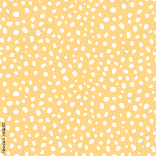 Yellow background vector with white dot patterns