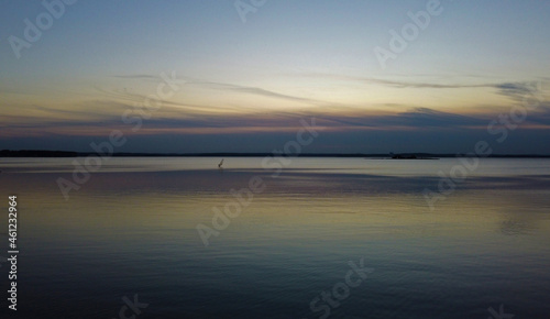 Top view of a beautiful dark sunset on the lake