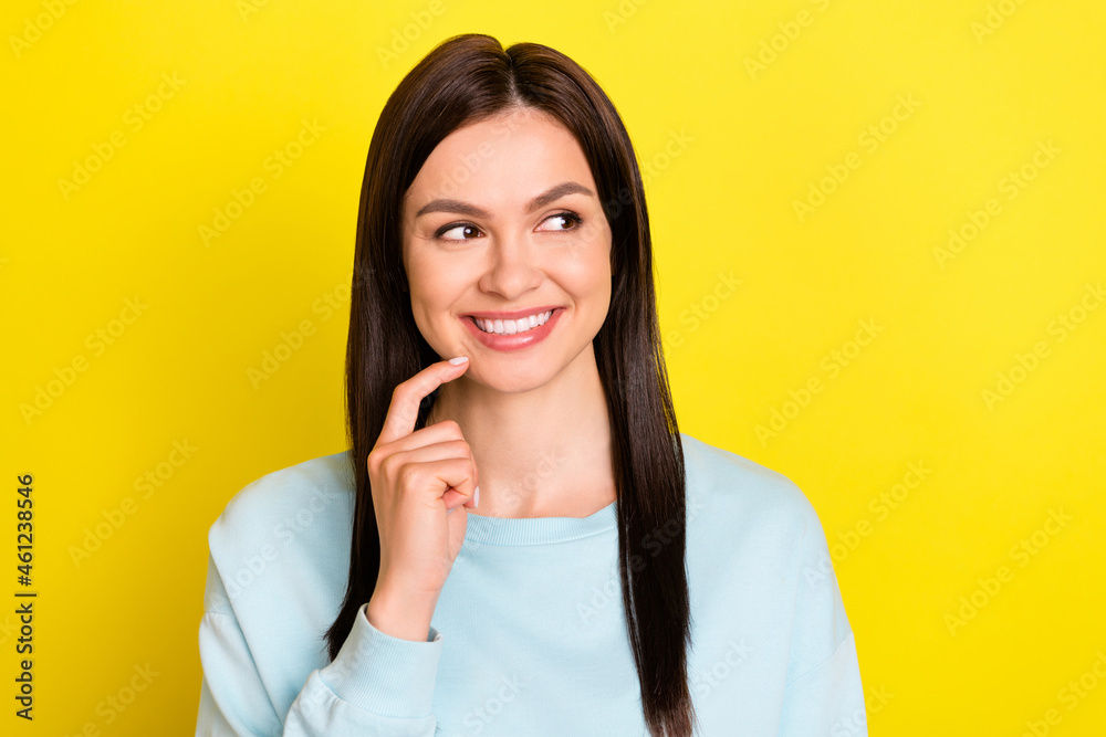 Portrait of attractive curious cheerful girl deciding copy blank space isolated over bright yellow color background Portrait of attractive curious cheerful girl deciding copy blank space isolated over bright yellow color background