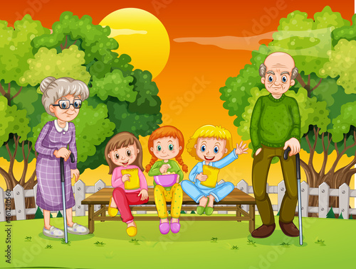 Grandma and grandpa with many children in the park