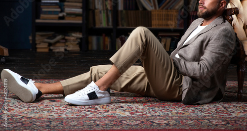 Fashion man sitting, linen, suit, wearing chinos
