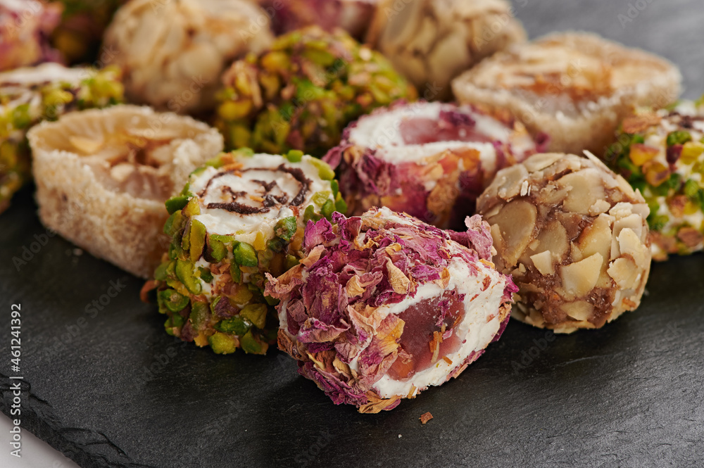 Turkish delight sweets on a stone slate board Turkish delight sweets on a stone slate board