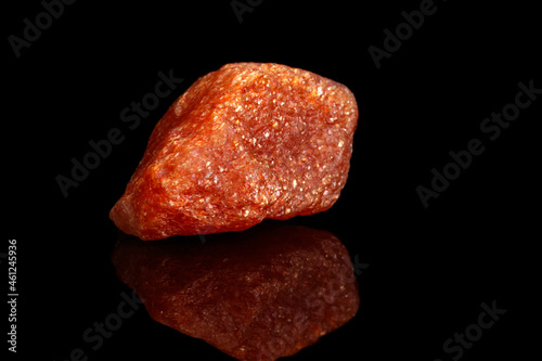 Macro mineral stone Nepheline sunny stone black background photo