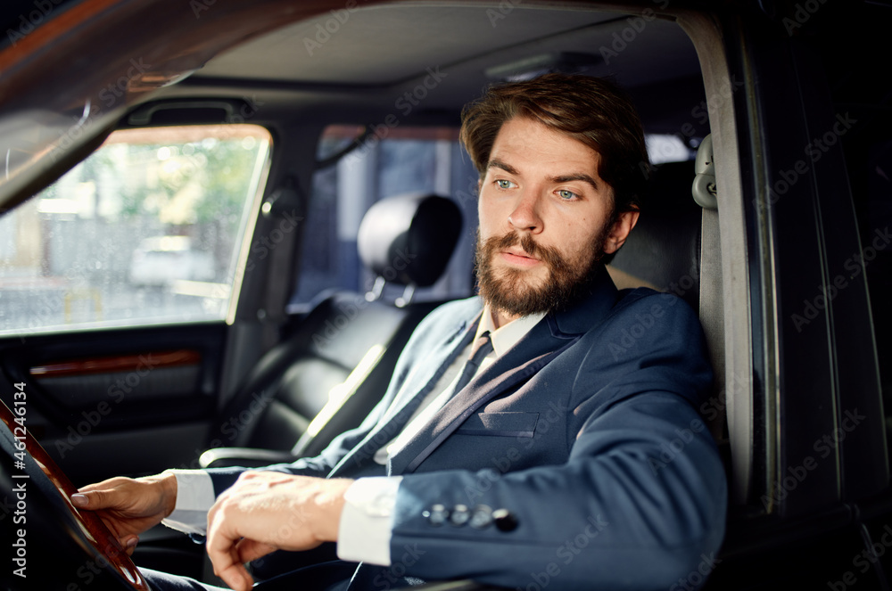 businessmen Driving a car trip luxury lifestyle communication by phone businessmen Driving a car trip luxury lifestyle communication by phone