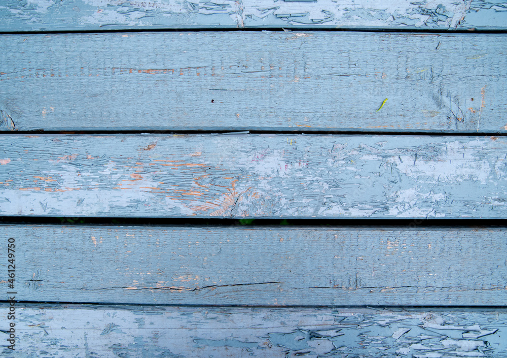 Wooden shield painted in light blue color,background,texture,copy space Wooden shield painted in light blue color,background,texture,copy space