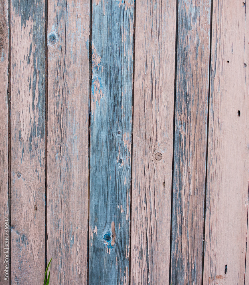 Naklejka premium Wooden shield painted in light blue color,background,texture,copy space