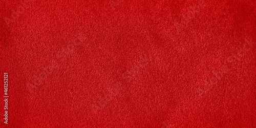 Foto Red suede leather texture. Macro photo of a red velvet texture.