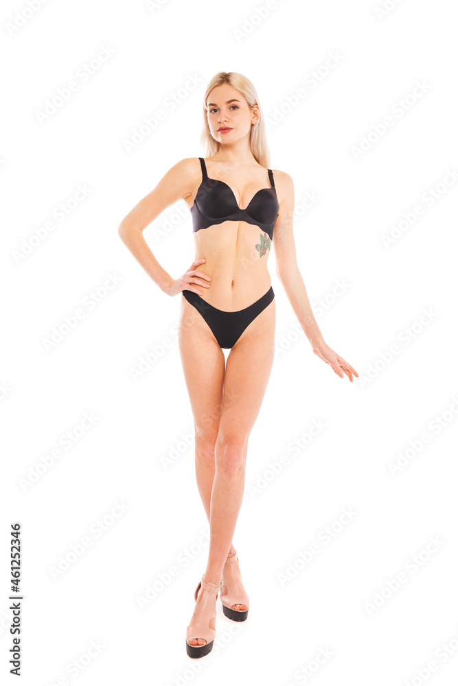 Full body portrait of a young beautiful blonde woman