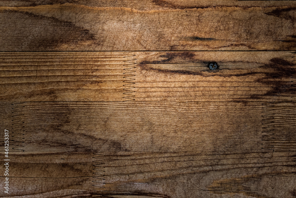 Fototapeta premium Aged wood texture, chips, cracks, nails in the surface, splinters, slats for construction, wooden canvases, beams with a relief, hollow, photophone for screensaver and printing