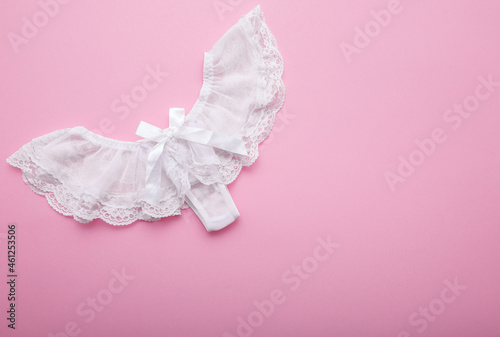 Panties Lace trunks of different colors set of female lower intimate romantic underwear on a pink background
