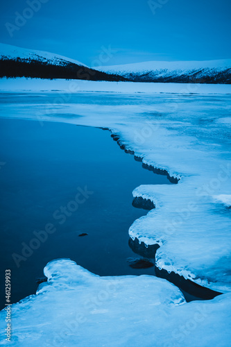 Ice at still lake, Sweden