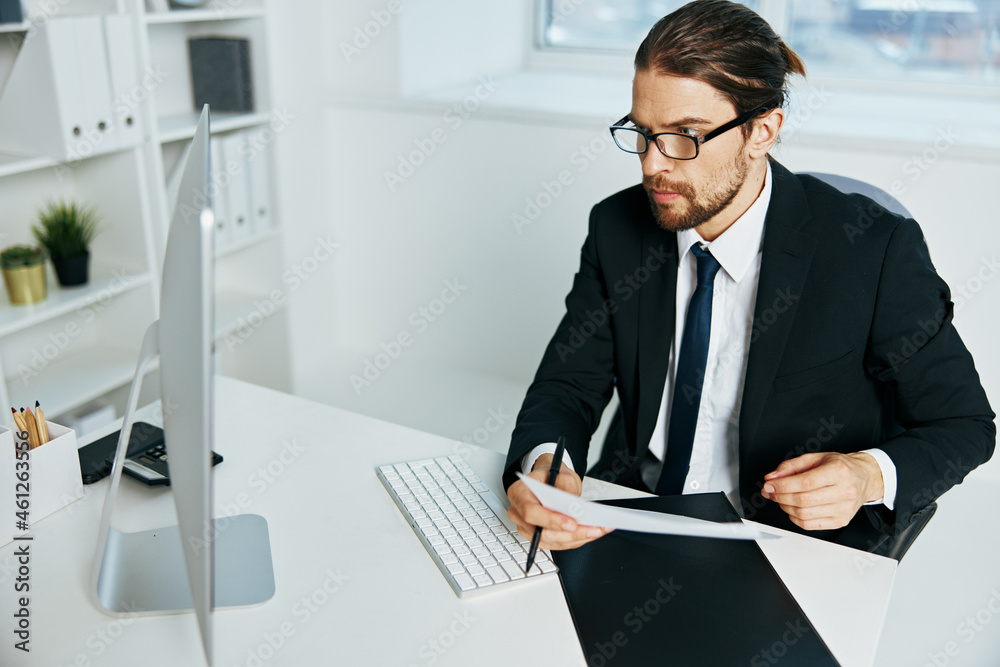 Fototapeta premium man in a suit documents in hand communication by phone Lifestyle
