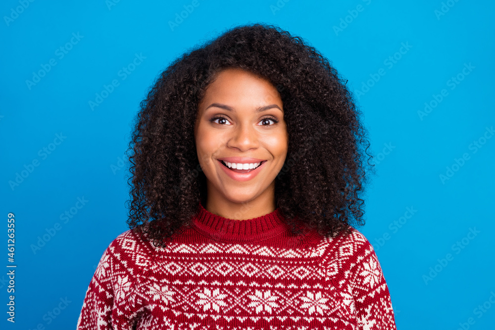 Portrait of attractive cheerful brunet wavy-haired girl good festal mood isolated over vibrant blue color background Portrait of attractive cheerful brunet wavy-haired girl good festal mood isolated over vibrant blue color background