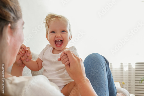 Bild auf Leinwand Portrait of a loving young mother holding her toddler child