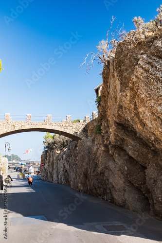 Beautiful Stone Bridge over street in Alassio, Italy
