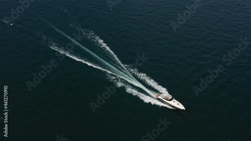 Wallpaper Mural Expensive luxury speed boat moving on the water top view. White boat movement on the water top view. Luxury boat fast movement on blue water, aerial view. Torontodigital.ca