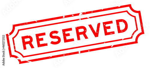 Grunge red reserved word rubber seal stamp on white background