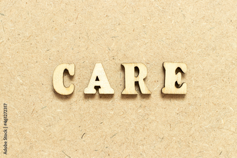 Alphabet letter in word care on wood background Alphabet letter in word care on wood background