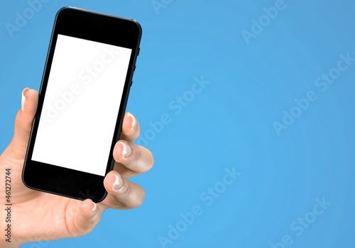 Male hand holding a smartphone with a blank screen