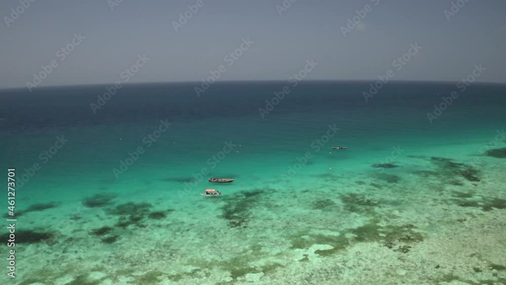 Tropical island of Zanzibar, Tanzania. Coastline, ocean and boats. Amazing nature and beautiful views Tropical island of Zanzibar, Tanzania. Coastline, ocean and boats. Amazing nature and beautiful views