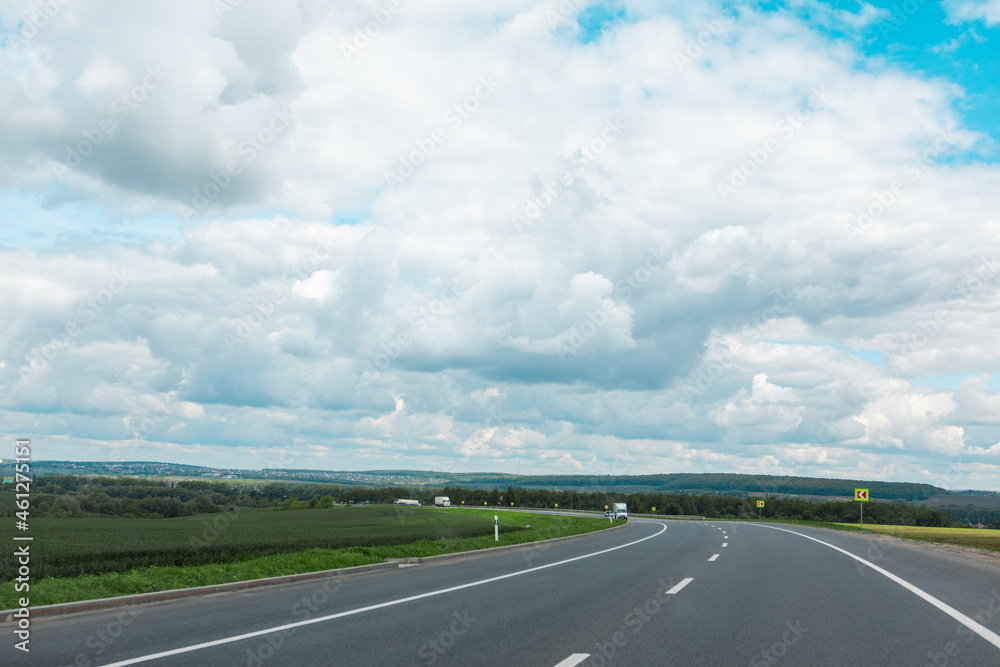 Fototapeta premium speedway at summertime cloudy sunny day